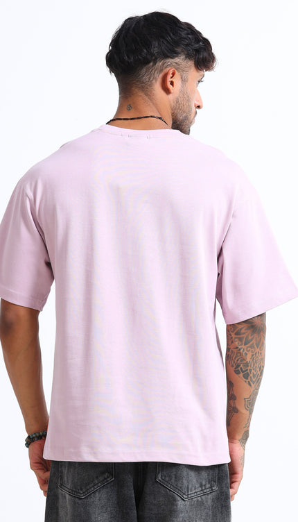 Person wearing a light pink t-shirt on a white background